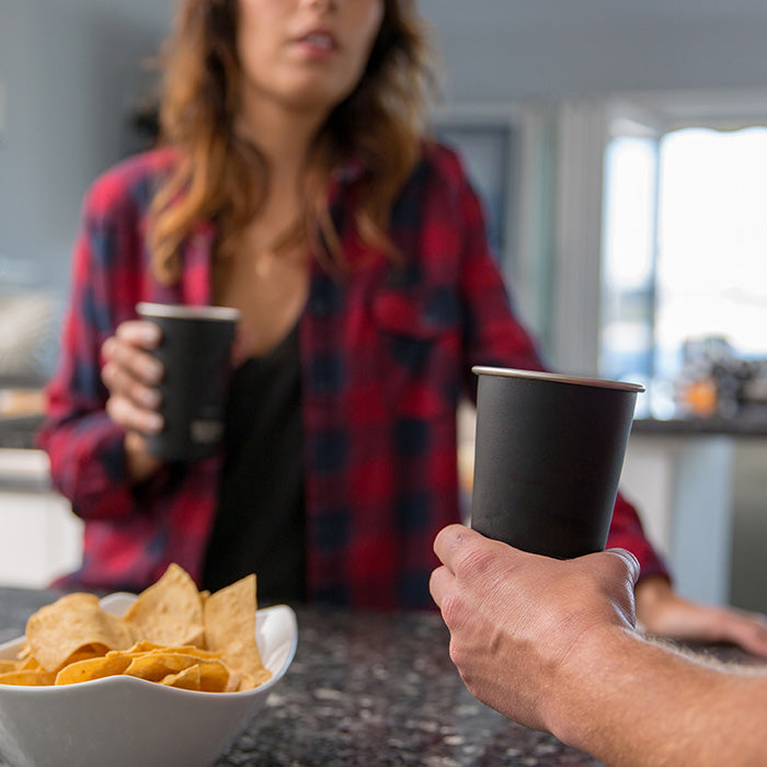 16oz-pint-cup-a4 16ounce_steel_pint_cup_black_party_lifestyle_e7c4b89f-bee2-44df-bb63-bc286febb421.jpg