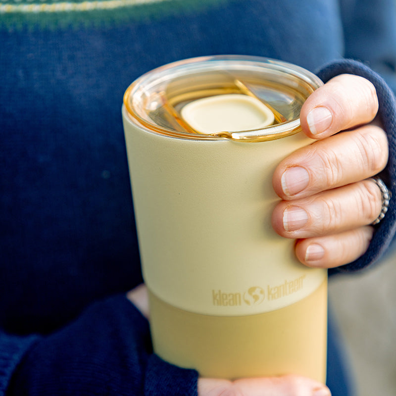 16oz-rise-tumbler-h7 16oz_rise_tumbler_wax_yellow_closeup_hand_lid_square.jpg