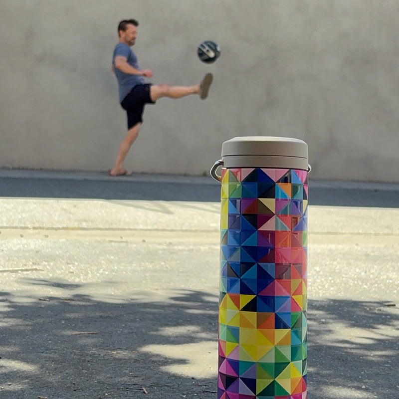 20oz-tkwide-with-twist-cap-mosaic-x4 20oz_tkwide_bottle_seasonal_mosaic_soccerball_player_square.jpg