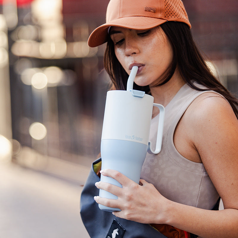 36oz-rise-tumbler-with-straw-lid-l4 36oz_rise_tumbler_straw_girl_sip_square.jpg