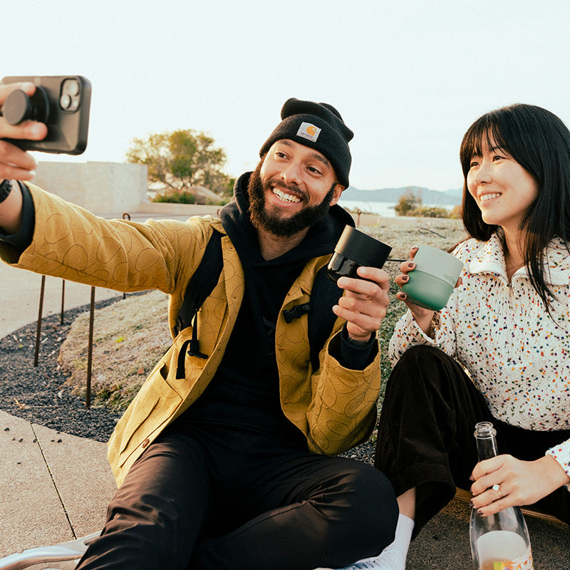 8oz-rise-lowball-tumbler-m4 8oz_rise_lowball_black_iceberg_couple_selfie_city_square.jpg
