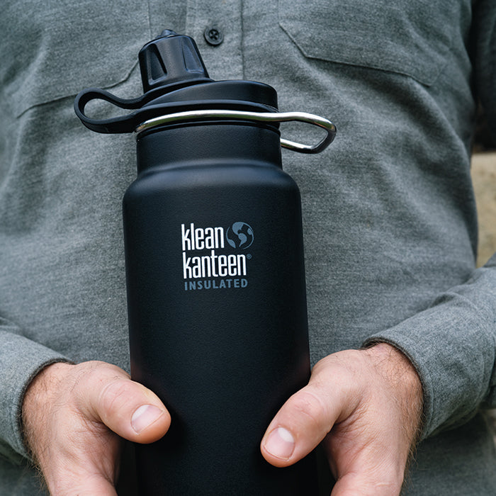 tkwide-chug-cap-x9 K32TKWSSL-SB-Craddled-Bottle_closeup_lifestyle.jpg