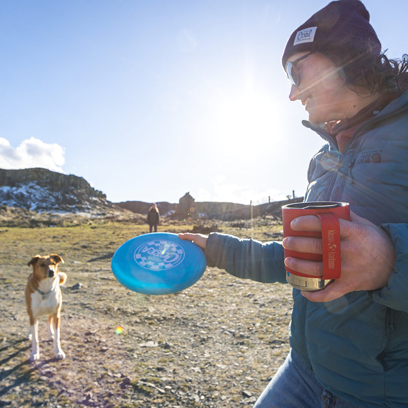 12oz-camp-mug-b9 insulated_camp_mug_12oz_woman_dog_frisbee_square.jpg