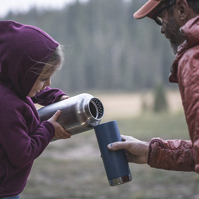 64oz-tkwide-with-loop-cap-v2 tkwide_64oz_bottle_girl_dad_filling_square.jpg
